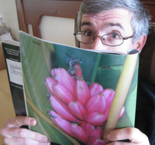 Plangarden founder, Roy Stahl, perusing Baker Creek Heirloom Seeds catalog